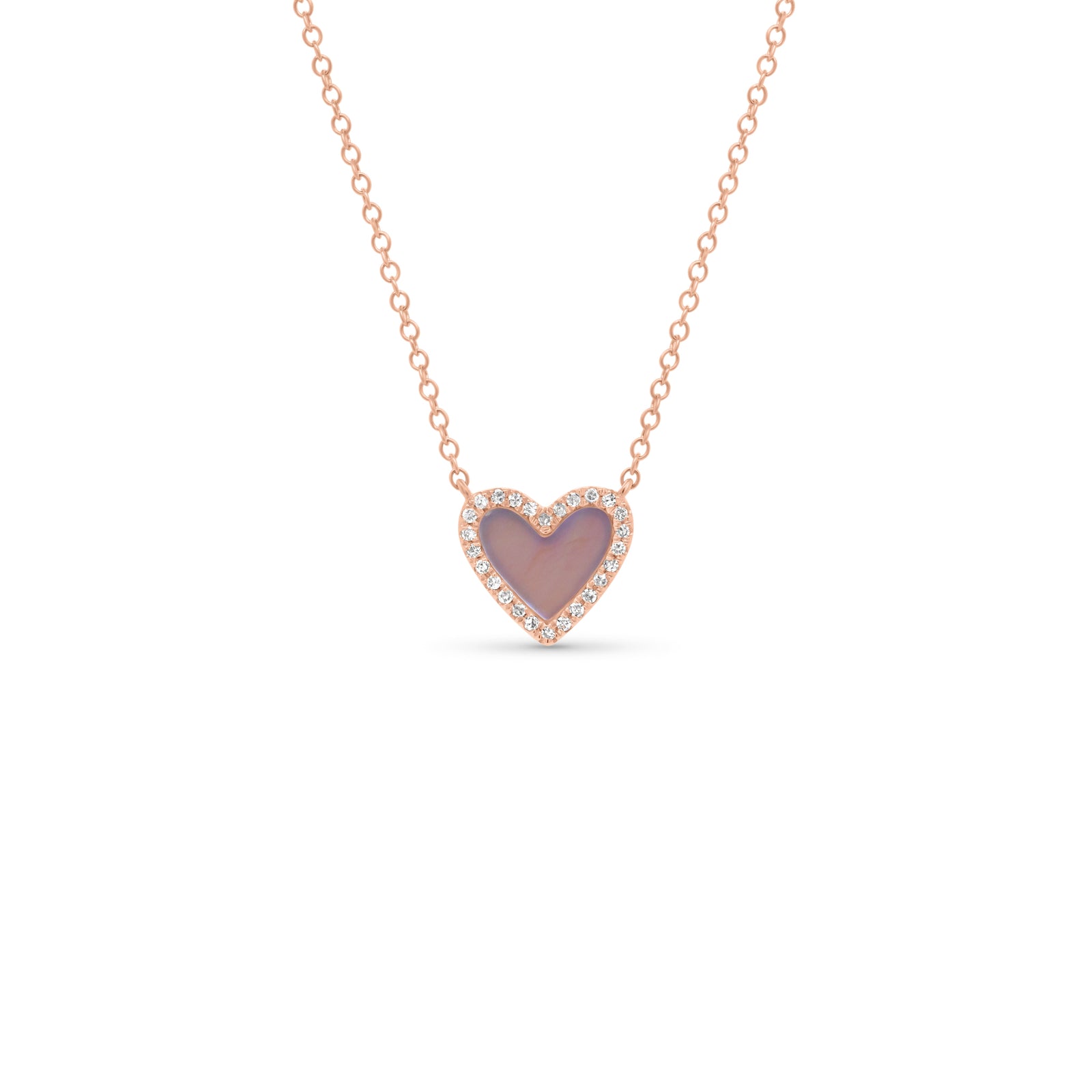 Mother of Pearl & Diamond Small Heart Pendant  - 14K gold weighing 1.57 grams  - 26 round diamonds totaling 0.07 carats  - Mother of pearl