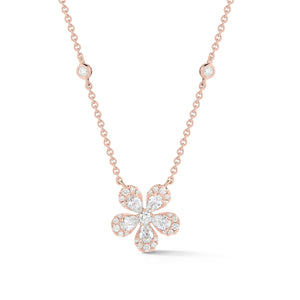 Diamond Flower Necklace  14k gold, 3.78 grams, 5 pear-shaped prong-set diamonds .47 carats, 1 round prong-set diamond .05 carats, 27 round prong-set diamonds .18 carats.  Size width 12.5 millimeters.