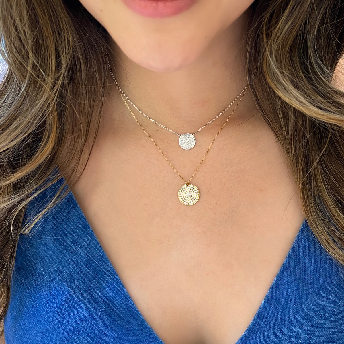 Pave Diamond Small Disc Pendant Necklace  -18K gold weighing 2.83 grams  -43 round diamonds totaling 0.50 carats.  Size width 12 millimeters.