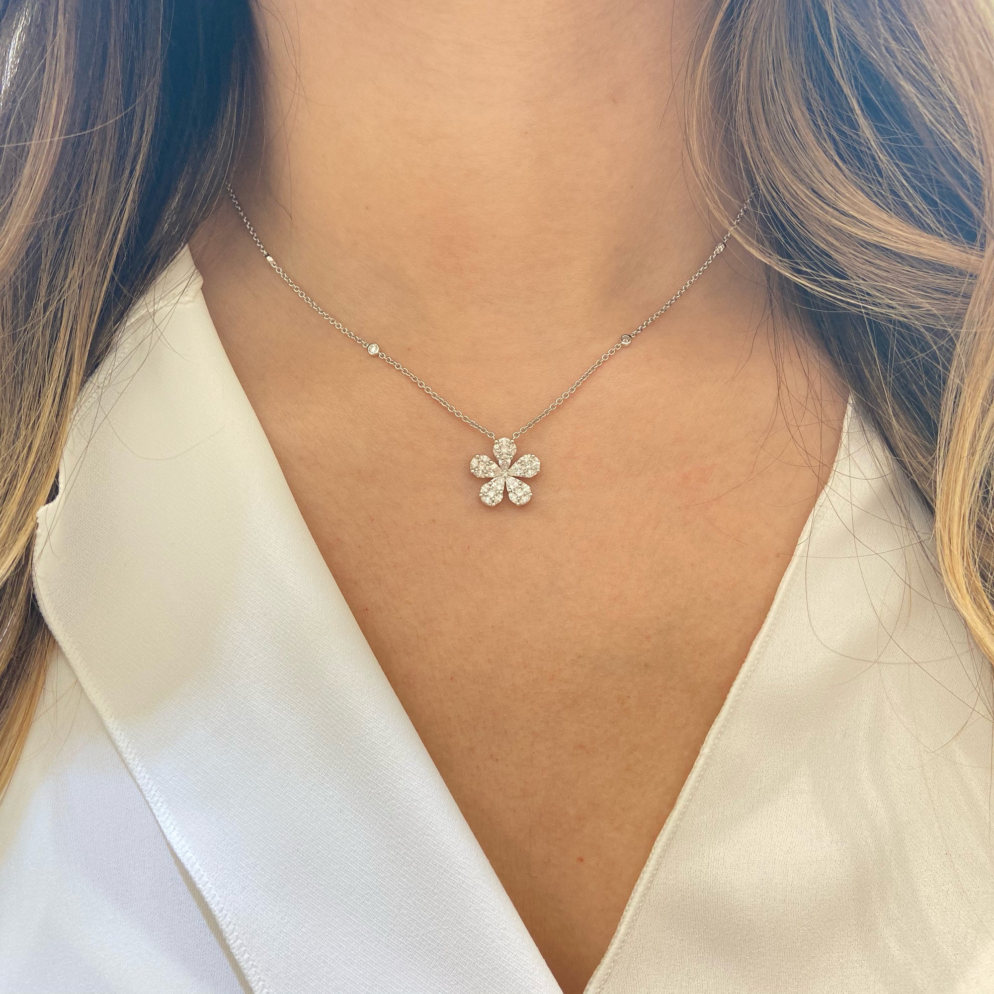 Diamond Daisy Pendant Necklace  Available in yellow, white, & rose gold.  Please allow 4-6 weeks for delivery if item is not in stock.