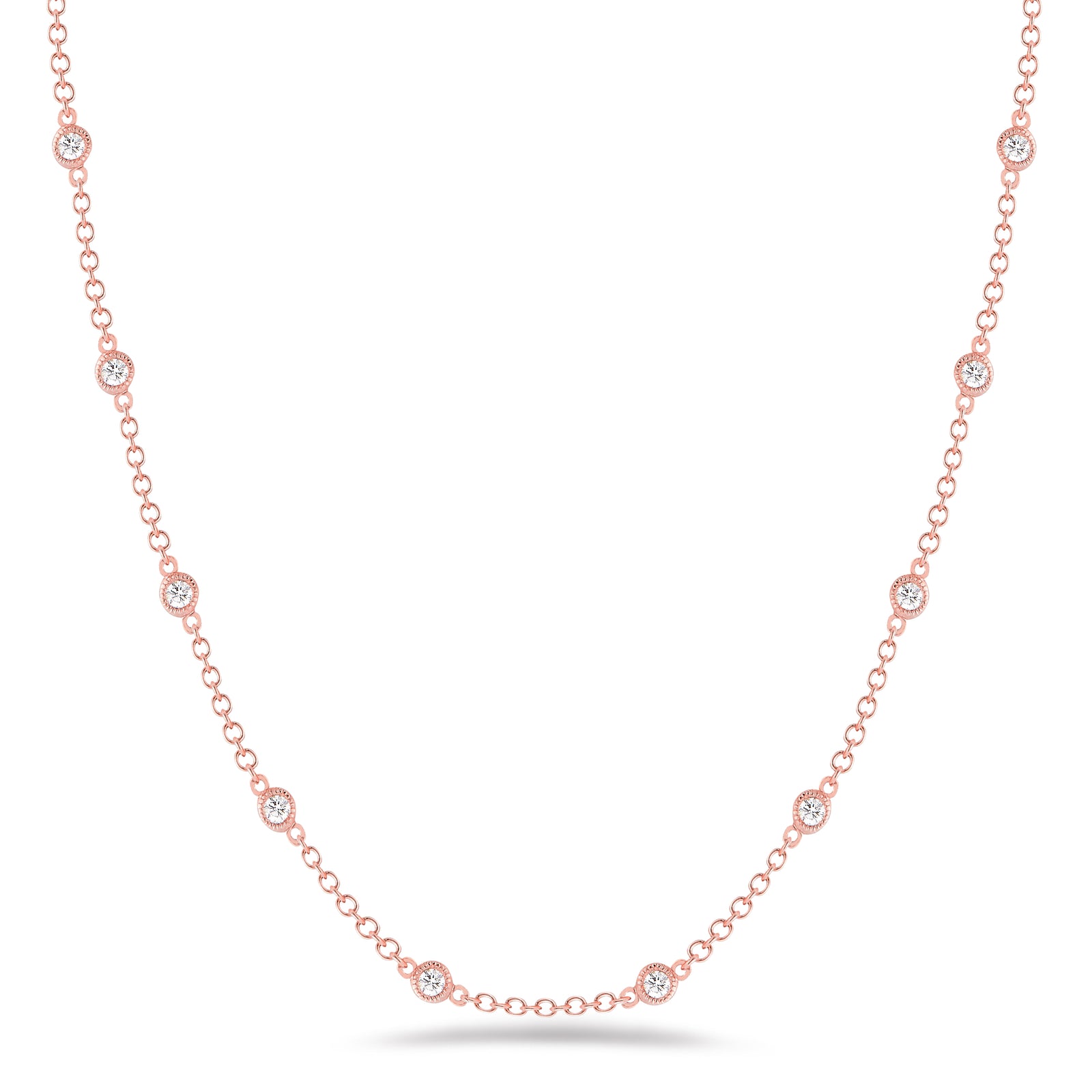 Diamond by the Yard  18k gold, 7.60 grams, 19 round bezel-set diamonds 1.88 carats, 18" length.