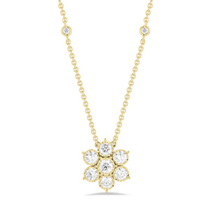 Diamond Flower Pendant with Bezel-Set Diamond Chain -18K yellow gold weighing 4.53 grams -7 round bezel-set diamonds totaling 1.06 carats (pendant) -4 round bezel-set diamonds totaling .08 carats (chain)