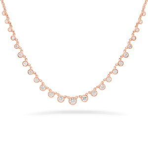 Diamond Bezels Graduated Necklace  - 14K gold weighing 4.21 grams  - 25 round diamonds totaling 0.73 carats