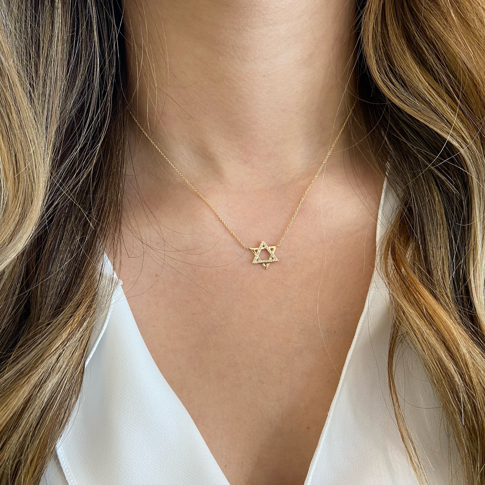 Diamond & Gold Star of David Pendant Necklace  -14K gold weighing 1.88 grams  -27 round pave-set diamonds totaling .08 carats.