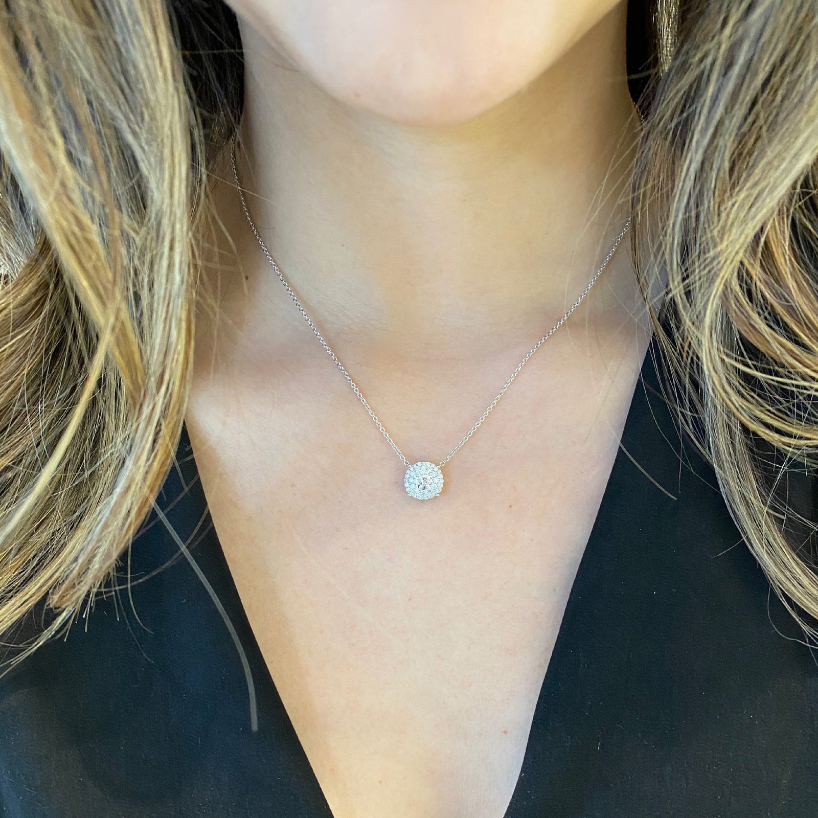 Diamond Double Halo Pendant Necklace  -18K white gold weighing 4.25 grams  -30 round pave-set diamonds totaling 0.48 carats