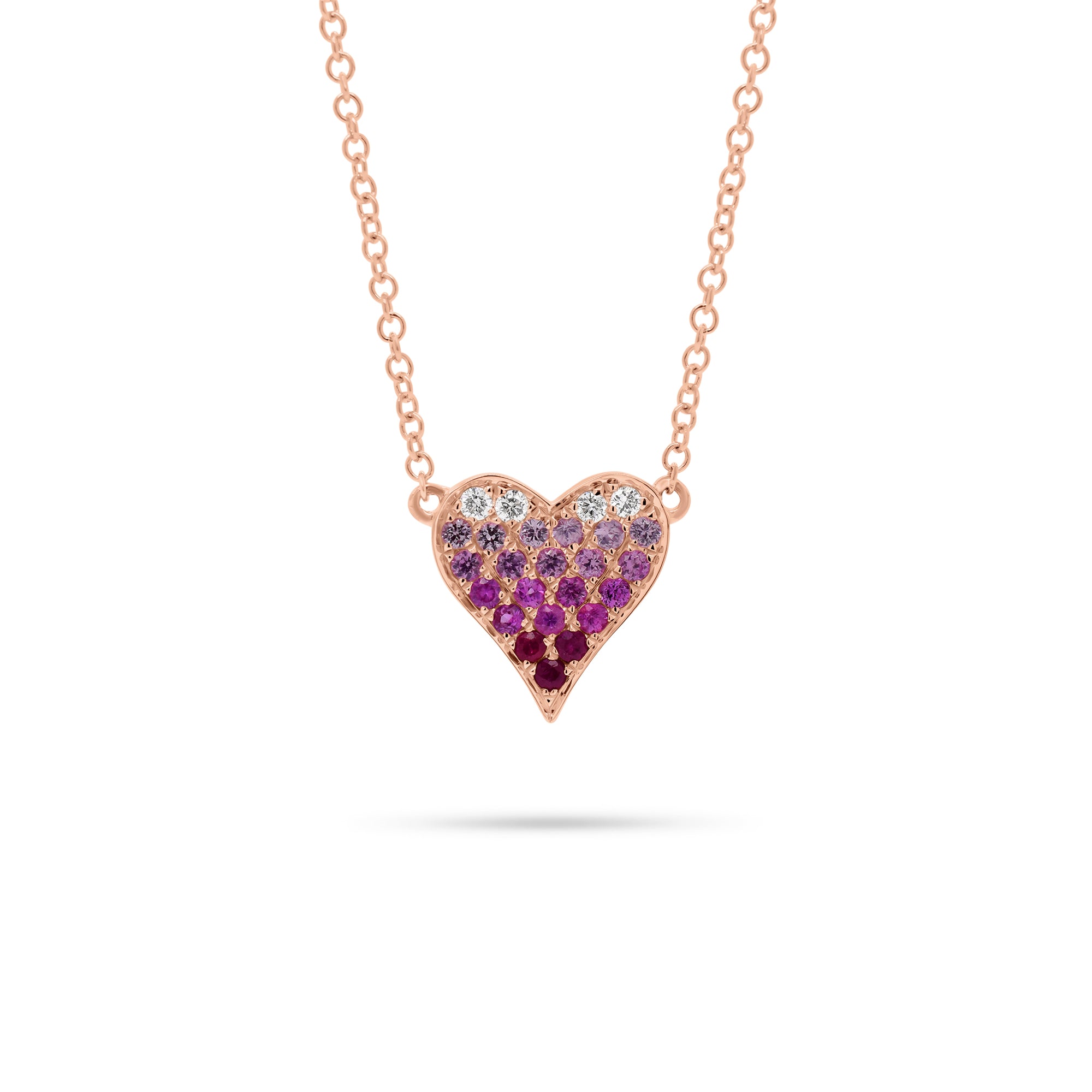 Pink Sapphire & Diamond Ombré Heart Pendant  - 14K rose gold weighing 1.98 grams  - 4 round diamonds totaling 0.05 carats  - 21 pink sapphires totaling 0.24 carats