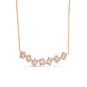Diamond Baguette Staggered Bar Necklace -14K rose gold weighing 3.33 grams -98 round pave-set diamonds totaling 0.23 carats -7 straight baguette diamonds totaling 0.29 carats