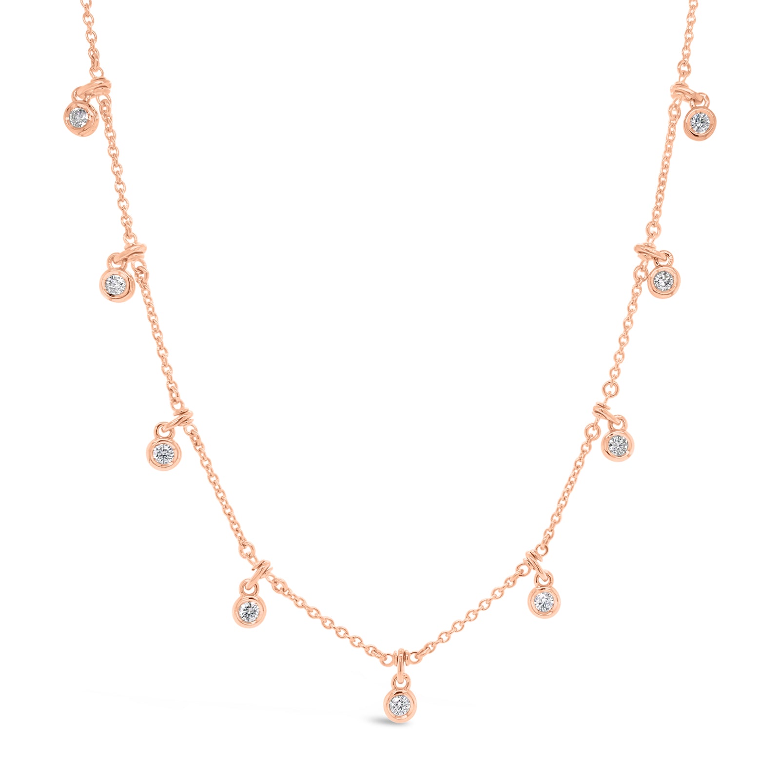 Diamond by the Yard Drip Necklace  - 14K gold weighing 6.25 grams.  - 9 round diamonds totaling 0.61 carats.