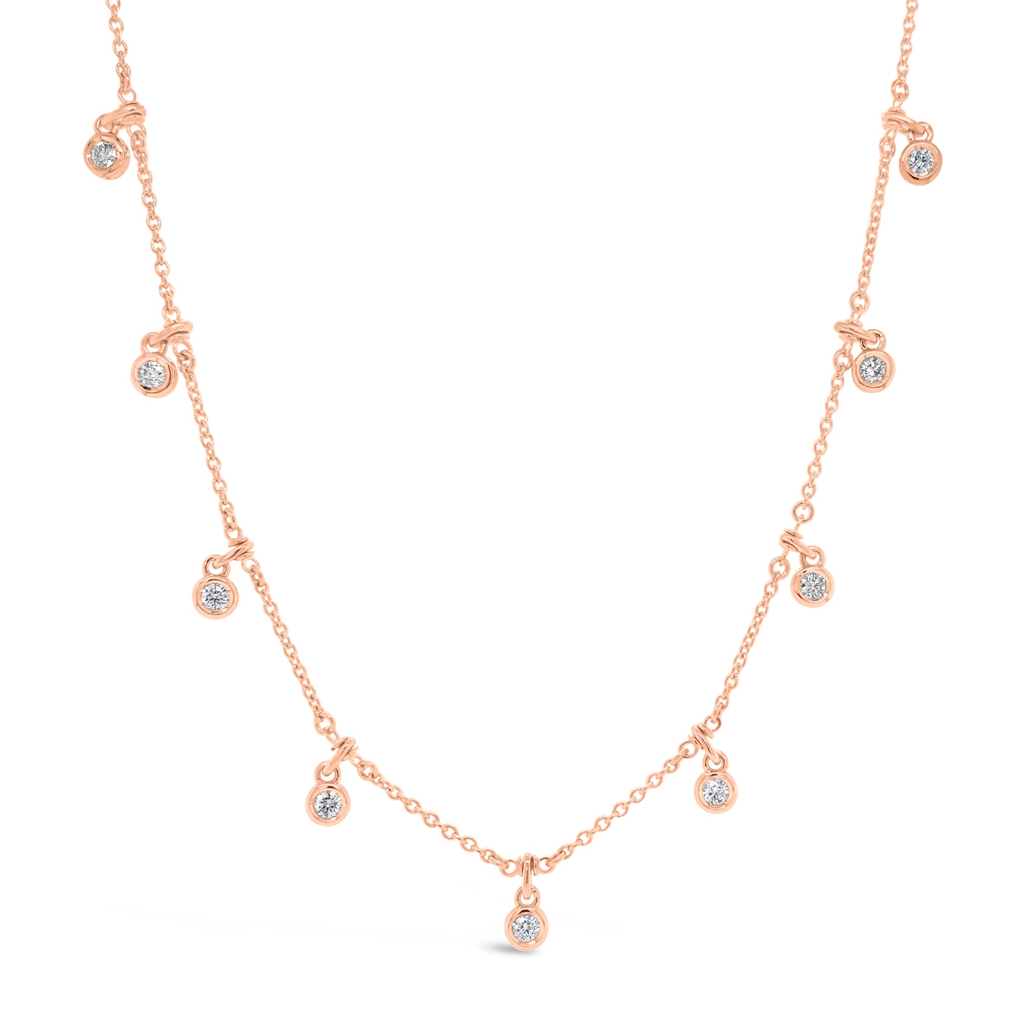 Diamond by the Yard Drip Necklace  - 14K gold weighing 6.25 grams.  - 9 round diamonds totaling 0.61 carats.