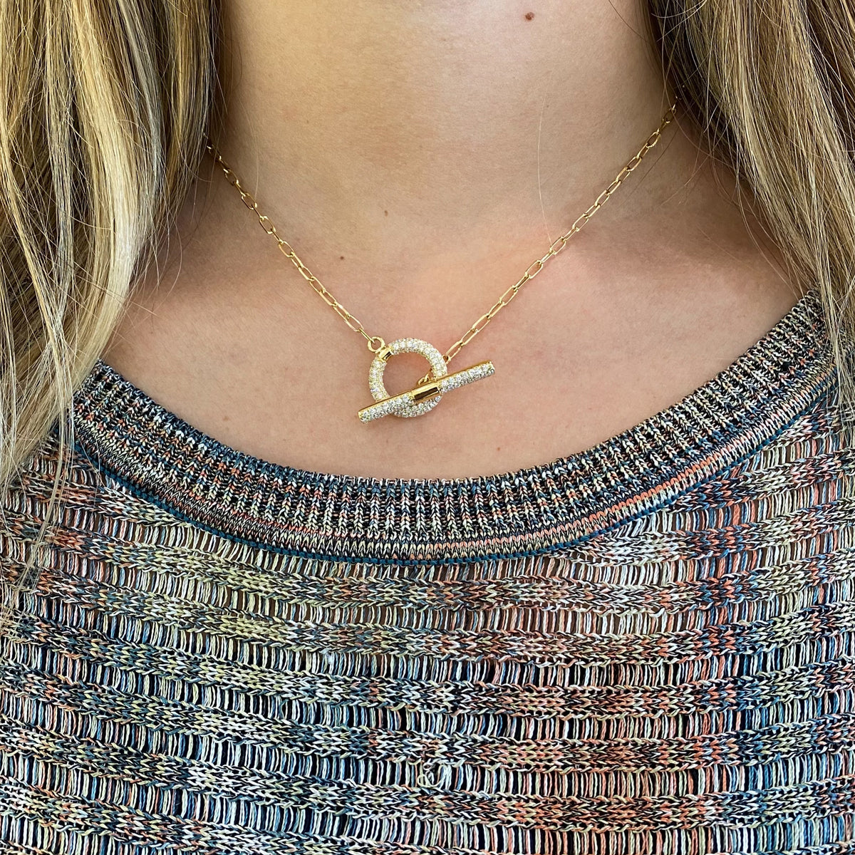 Female model wearing Pave Diamond Toggle Pendant Necklace - 18K gold weighing 9.62 grams  - 130 round diamonds weighing 1.20 carats