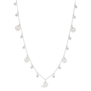 Pearl & Diamond Dangle Necklace   -14K gold weighing 2.73 grams  -12 round diamonds totaling 0.16 carats