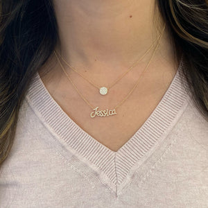 Female Model Wearing Diamond Single-cut Name Necklace  - 14K gold weighing 2.18 grams  - 85 round diamonds weighing 0.21 carats