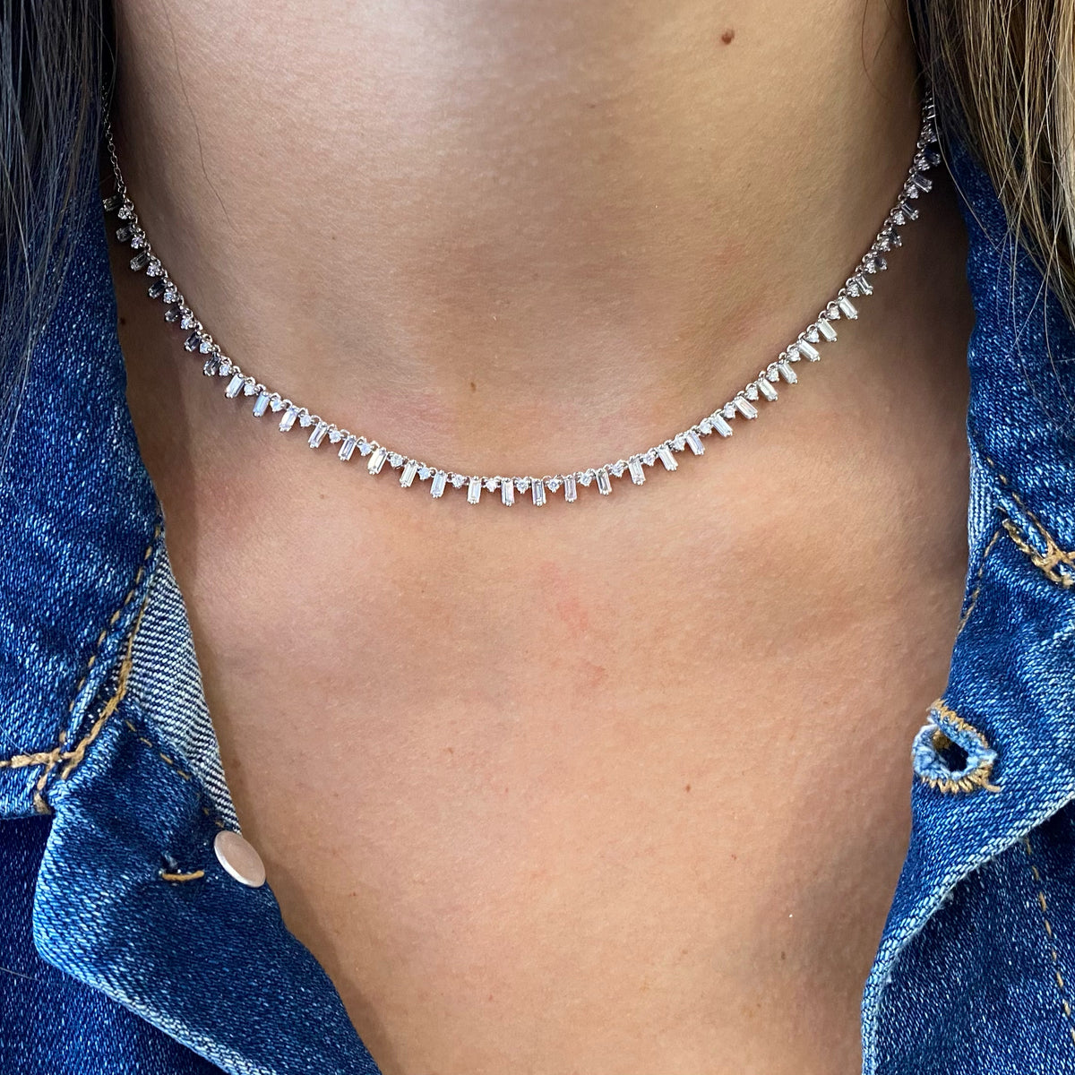 Female Model Wearing Baguette & Round Diamond Fashion Necklace  - 14K gold weighing 6.00 grams  - 38 slim baguettes totaling 1.81 carats  - 37 round diamonds totaling 0.59 carats