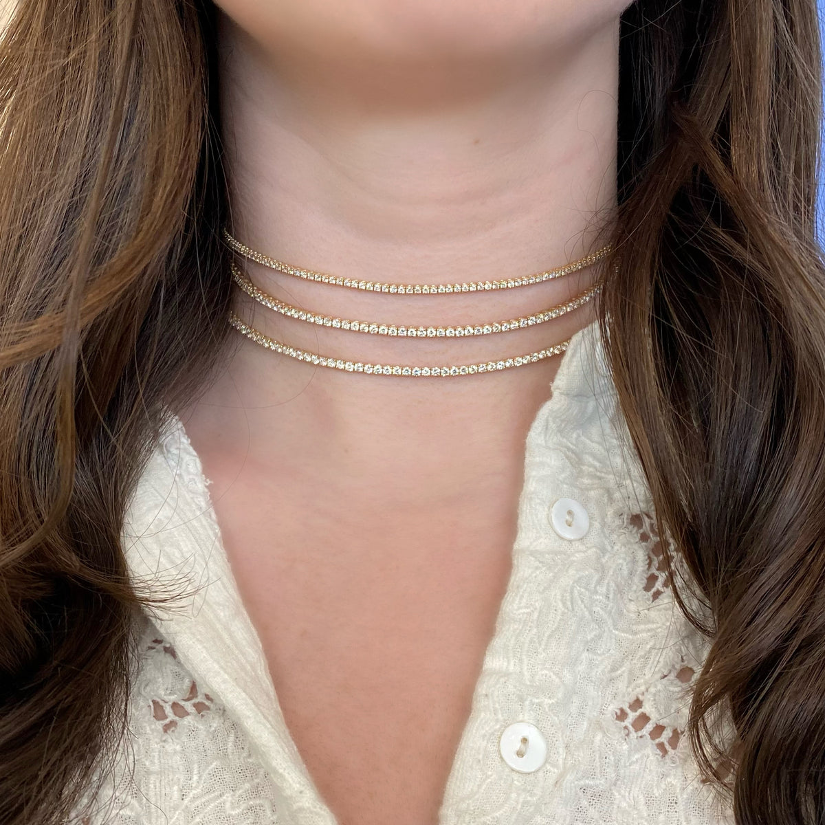 3.41 CT Diamond Adjustable Tennis Choker  - 14K gold weighing 8.54 grams  - 78 round diamonds totaling 3.41 carats