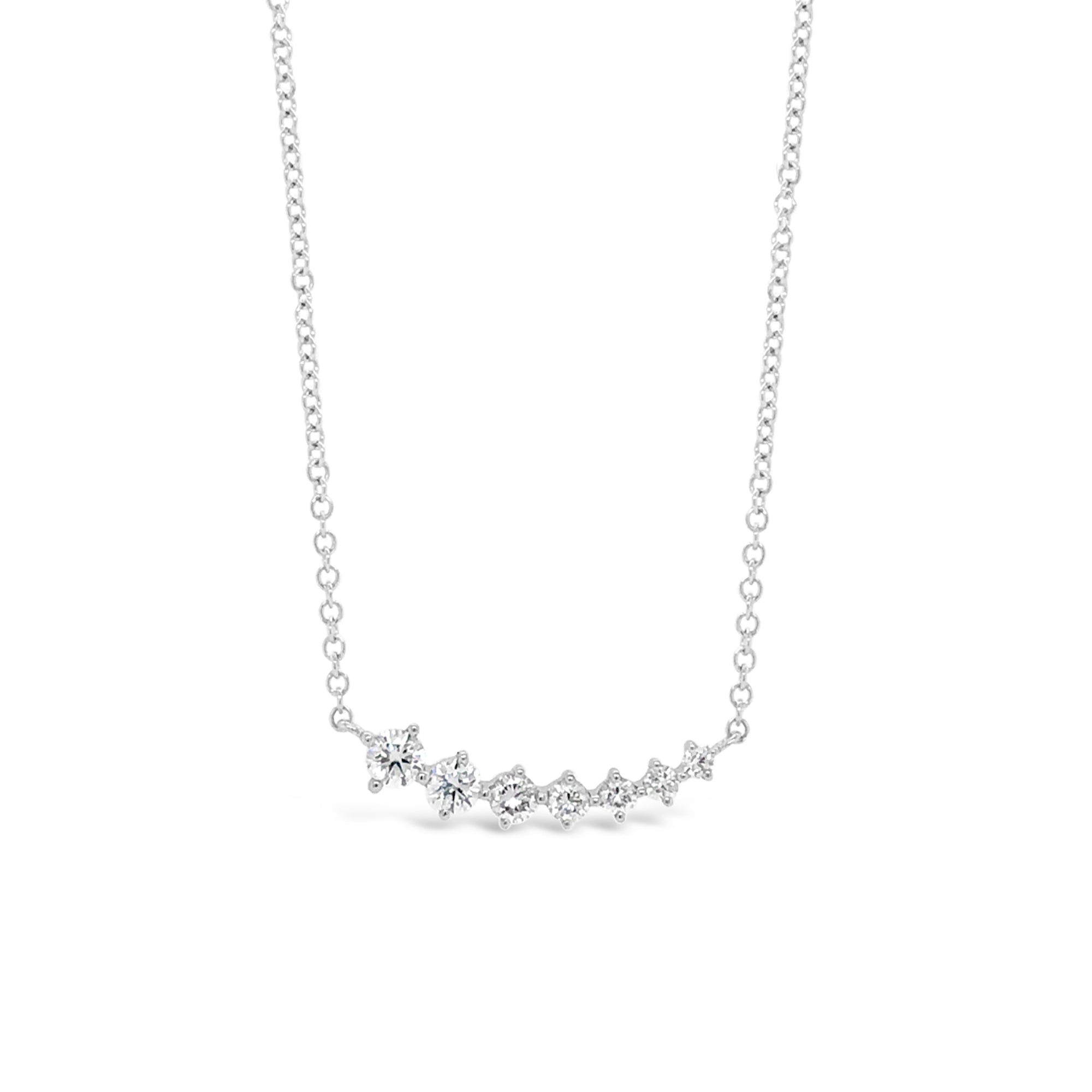 Prong-set Diamond Bar Necklace  -14k gold weighing 1.64 grams  -7 round diamonds weighing .27 carats