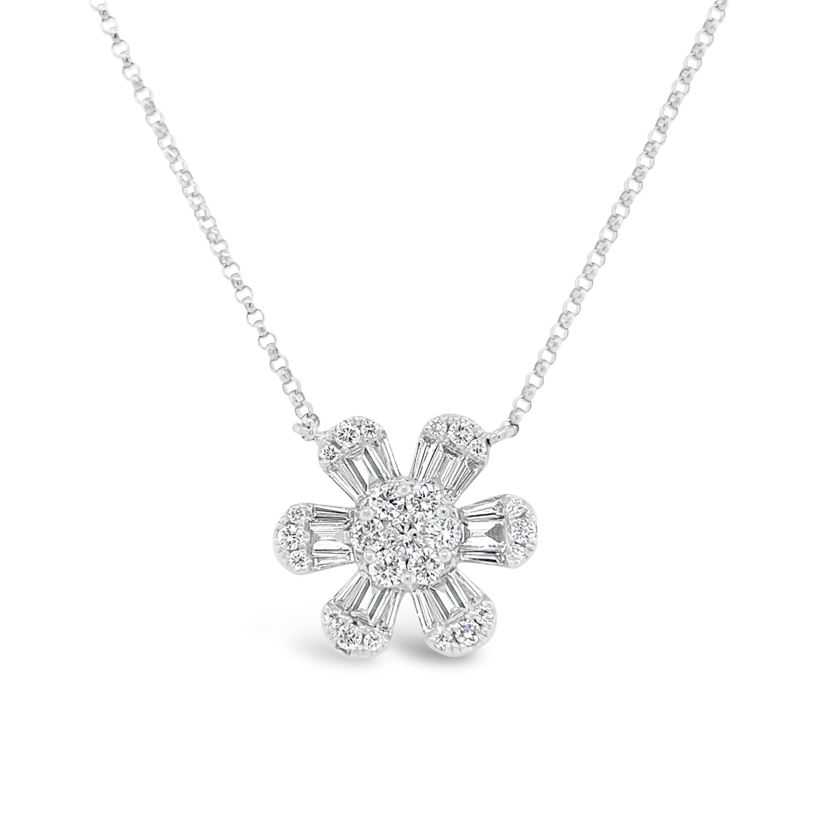 Round & Baguette Diamond Flower Pendant  -14K gold weighing 3.56 grams  -25 round diamonds totaling 0.47 carats  -18 straight baguettes totaling 0.46 carats