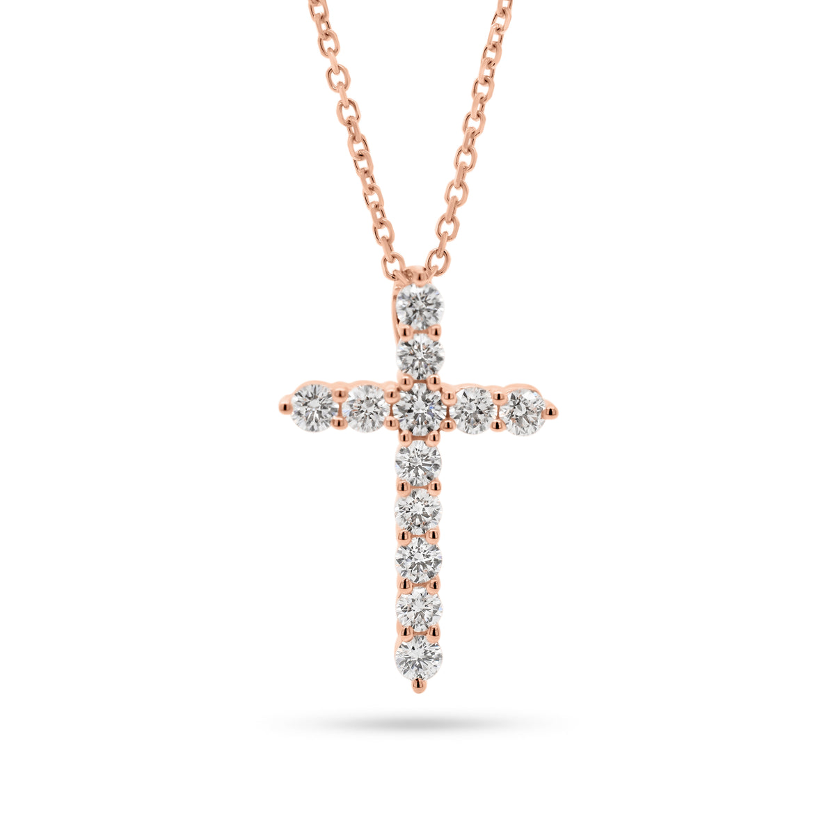 Diamond 12-Stone Cross Pendant  - 14K gold weighing 2.85 grams  - 12 round diamonds totaling 0.56 carats