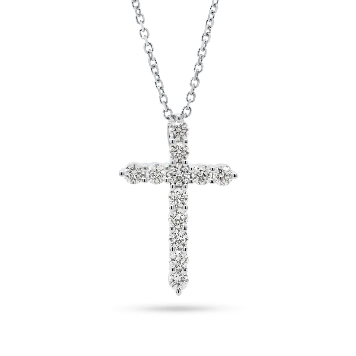 Diamond 12-Stone Cross Pendant  - 14K gold weighing 2.85 grams  - 12 round diamonds totaling 0.56 carats