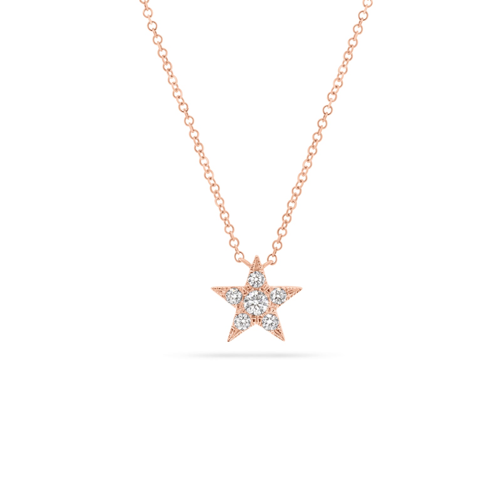 Diamond Twinkling Star Pendant  - 14K gold weighing 1.71 grams  - 6 round diamonds totaling 0.22 carats