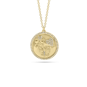 Diamond Luck, Love, and Happiness Disc Pendant  - 14K gold weighing 5.18 grams  - 95 round diamonds totaling 0.21 carats  - 14K gold weighing 4.71 grams  - 83 round diamonds totaling 0.18 carats