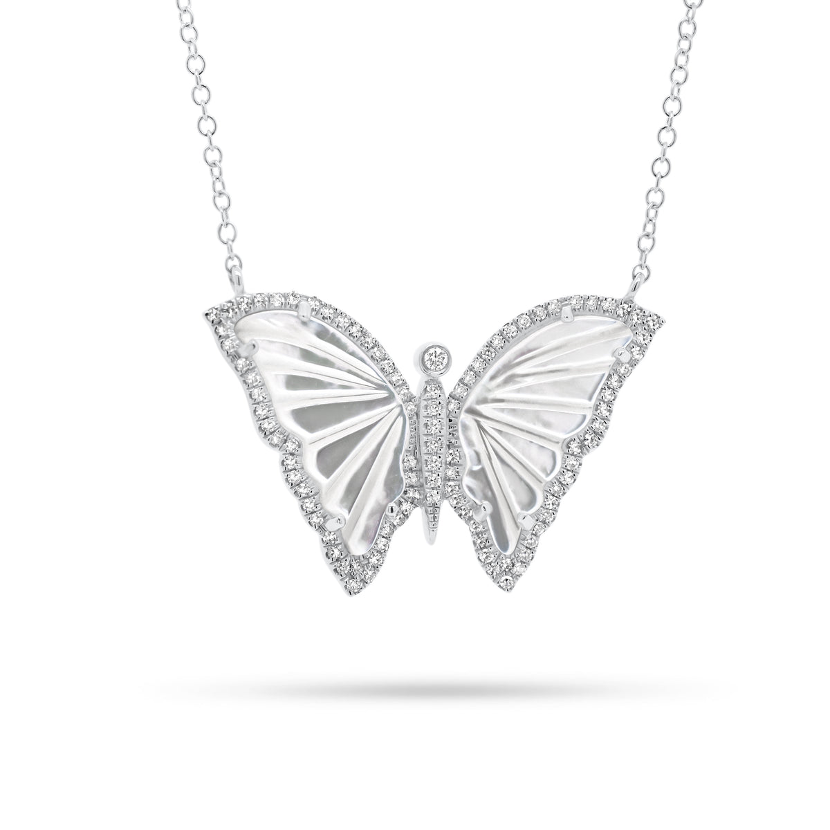 Mother of Pearl & Diamond Butterfly Pendant  - 14K gold weighing 3.10 grams  - 96 round diamonds totaling 0.22 carats  - 2 Mother of Pearl slices