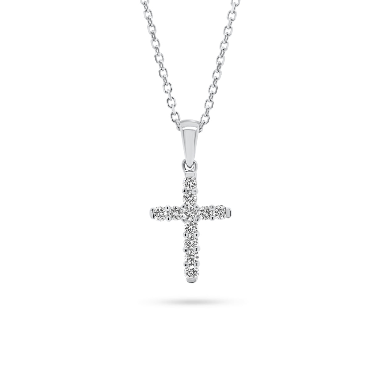 Diamond 11-Stone Cross Pendant  - 14K gold weighing 2.36 grams  - 11 round diamonds totaling 0.20 carats