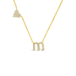 Diamond mini lowercase initial necklace -14k gold 1.8 grams  -10 round prong-set diamonds .08 carats (varies per letter)  - Chain measures 16"  -Letter width 6 millimeters, length 7 millimeters.