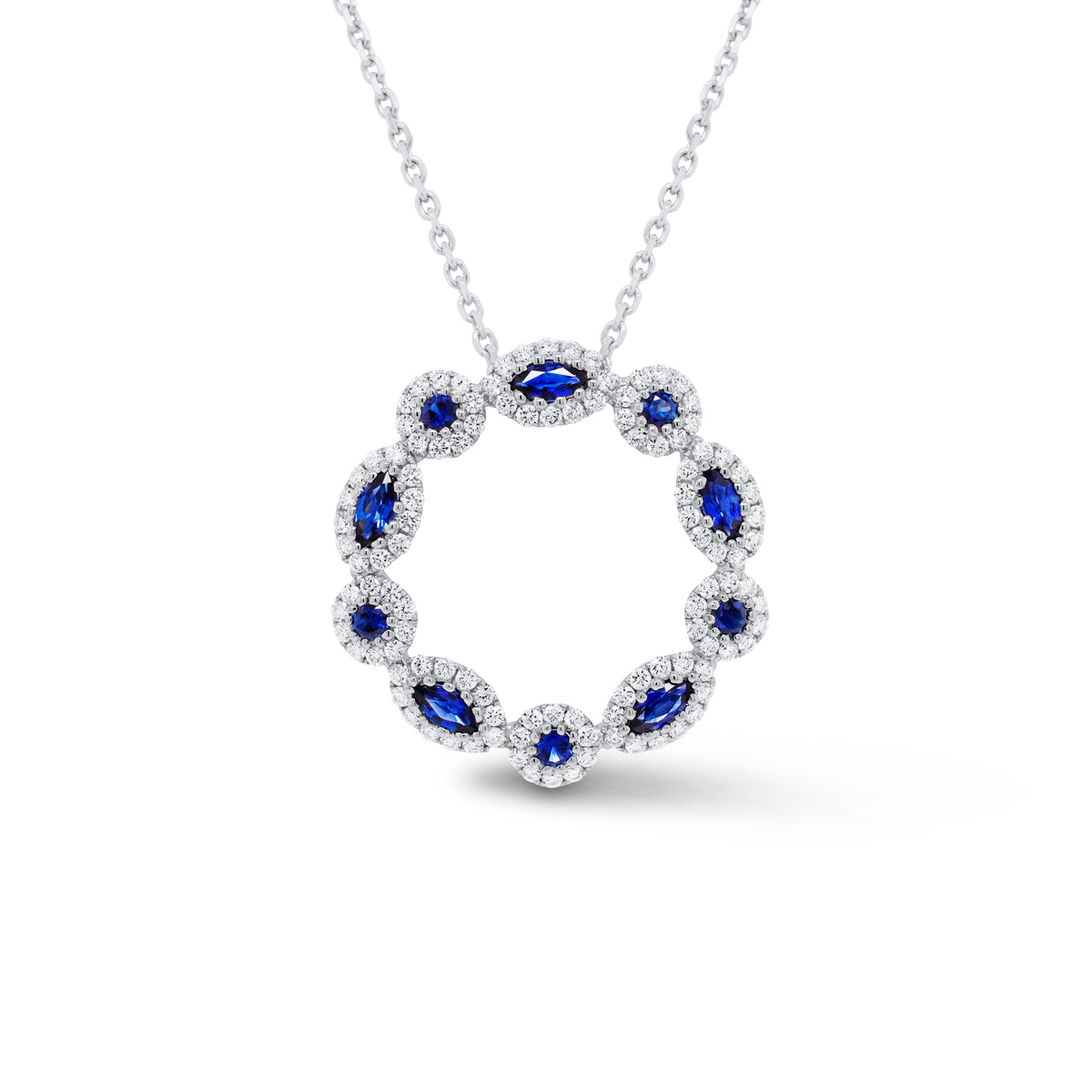 Sapphire & Diamond Wreath Pendant  - 18K gold weighing 3.13 grams  - 14K gold weighing 2.20 grams  - 110 round diamonds totaling 0.66 carats  - 10 sapphires totaling 0.64 carats