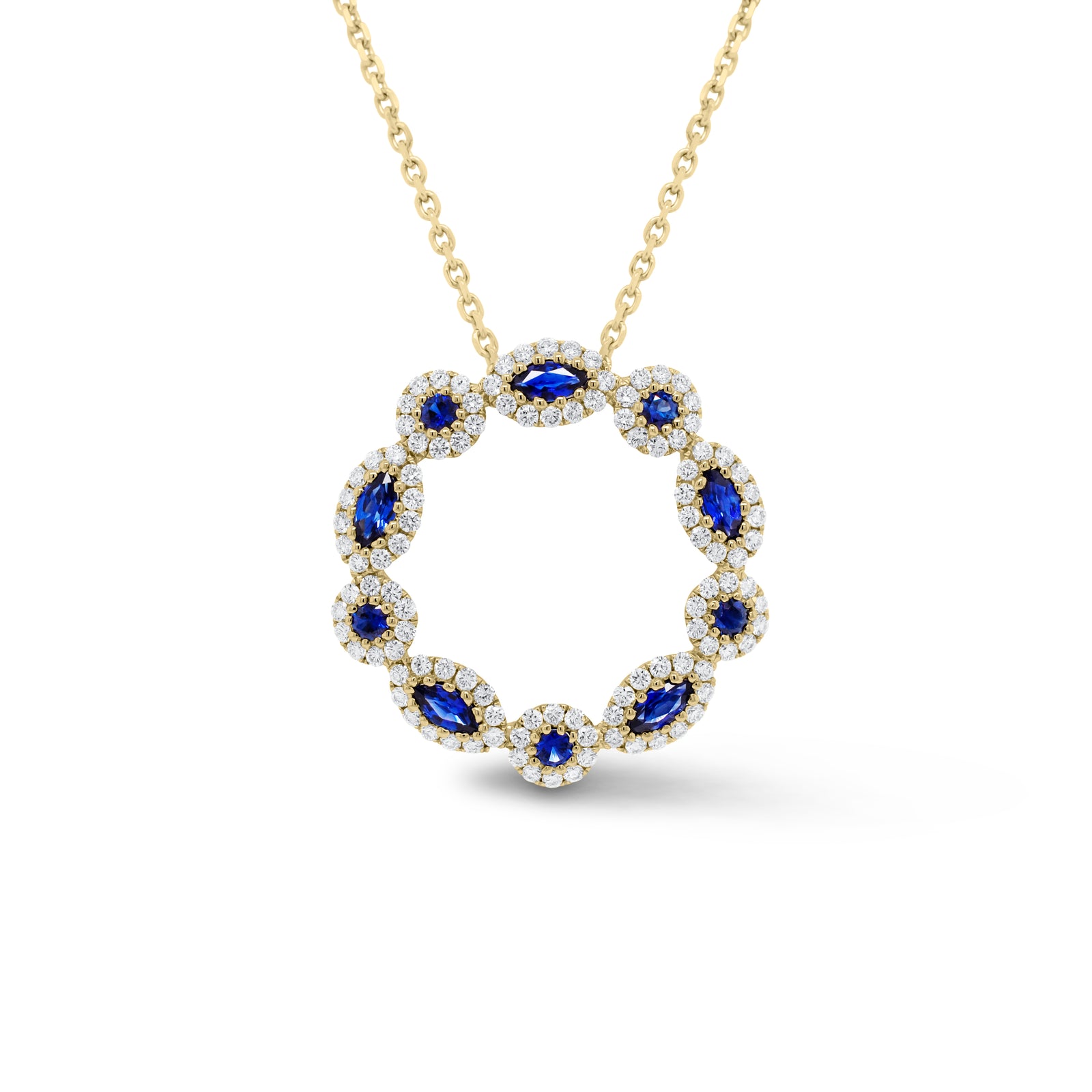 Sapphire & Diamond Wreath Pendant  - 18K gold weighing 3.13 grams  - 14K gold weighing 2.20 grams  - 110 round diamonds totaling 0.66 carats  - 10 sapphires totaling 0.64 carats