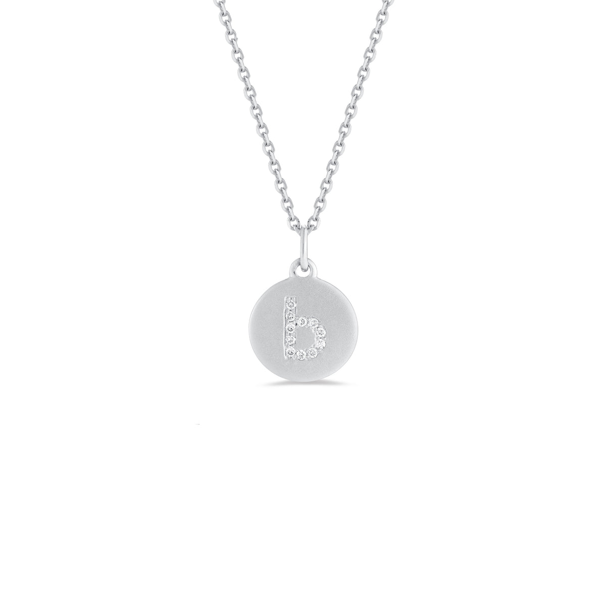 Mini Diamond Initial Disc Pendant  -14k gold weighing 2.30 grams  -Round diamonds prong set diamonds  -Disc measures diameter 10 millimeters.