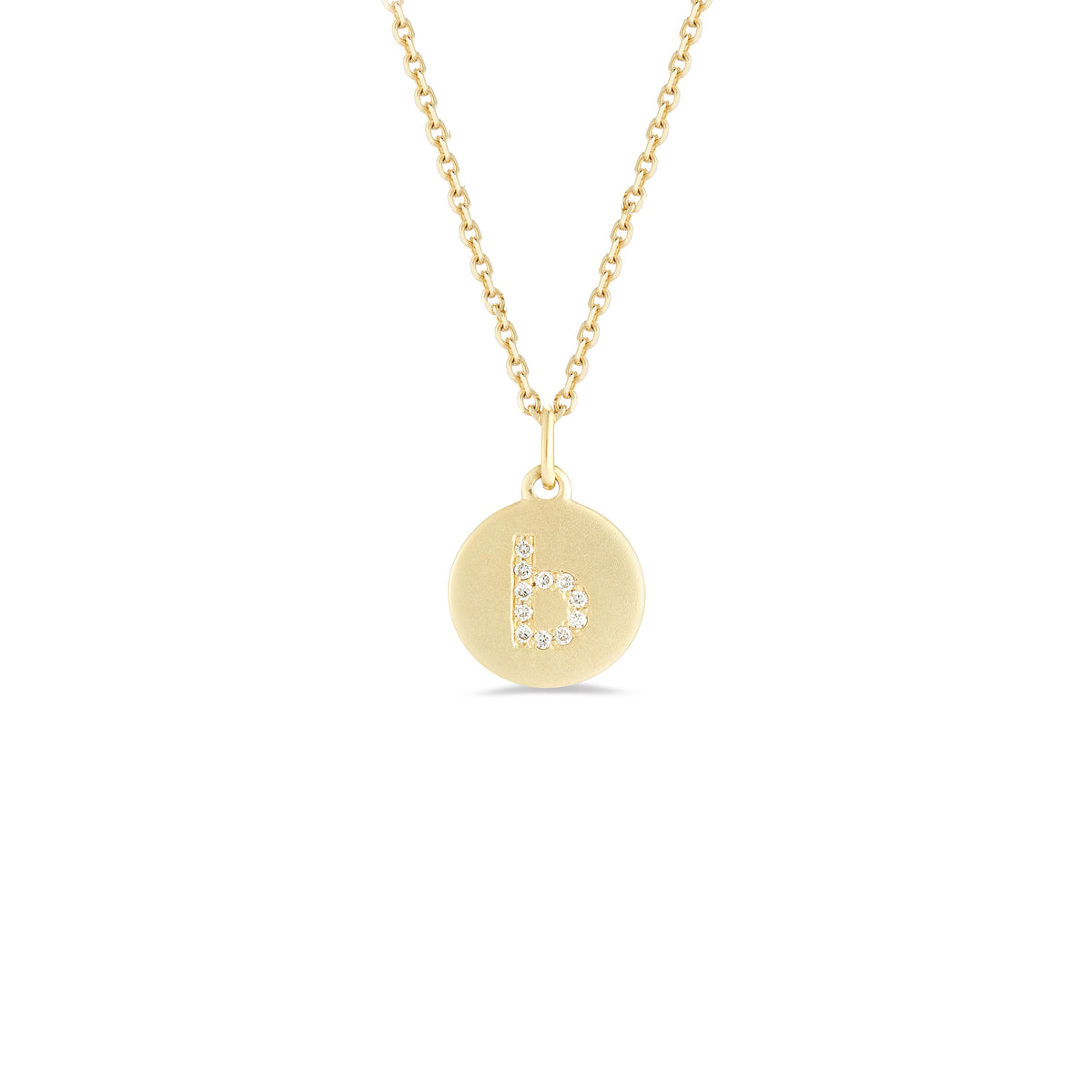 Mini Diamond Initial Disc Pendant  -14k gold weighing 2.30 grams  -Round diamonds prong set diamonds  -Disc measures diameter 10 millimeters.