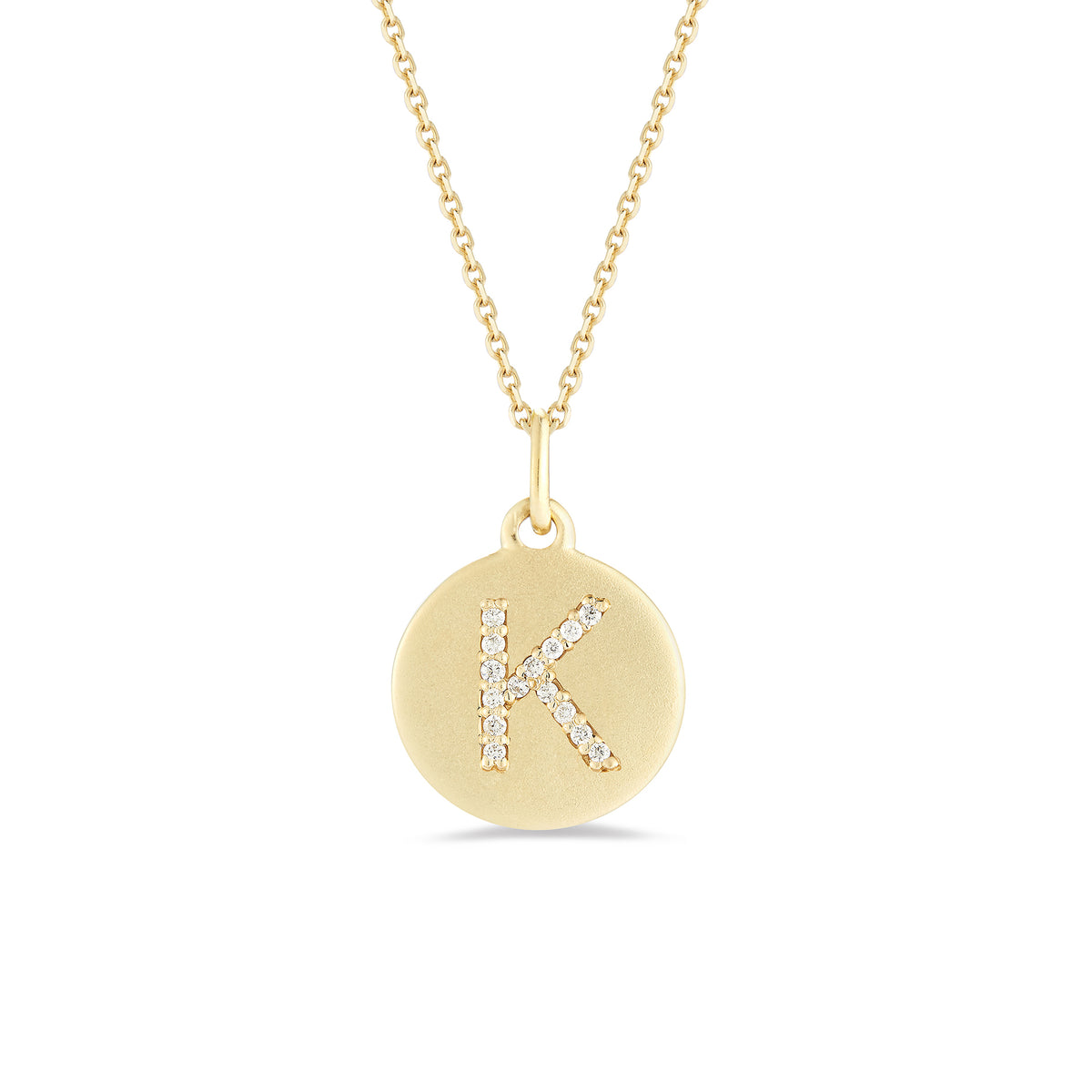 Diamond initial disc pendant - 14k gold weighing 4.0 grams  - 15 Round prong set diamonds totaling 0.08 carats.  Disc measures 15 millimeters diameter.
