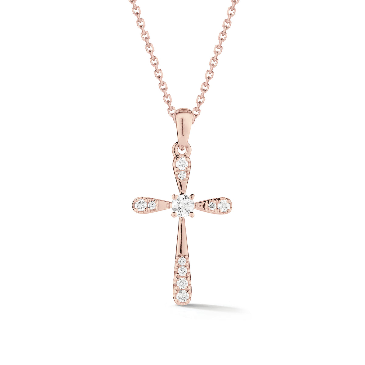 Diamond & Gold Rounded Cross Pendant Necklace  An ideal christening, communion, confirmation, birthday, or holiday gift.  -14K gold weighing 1.57 grams  -8 round prong-set diamonds totaling 0.09 carats