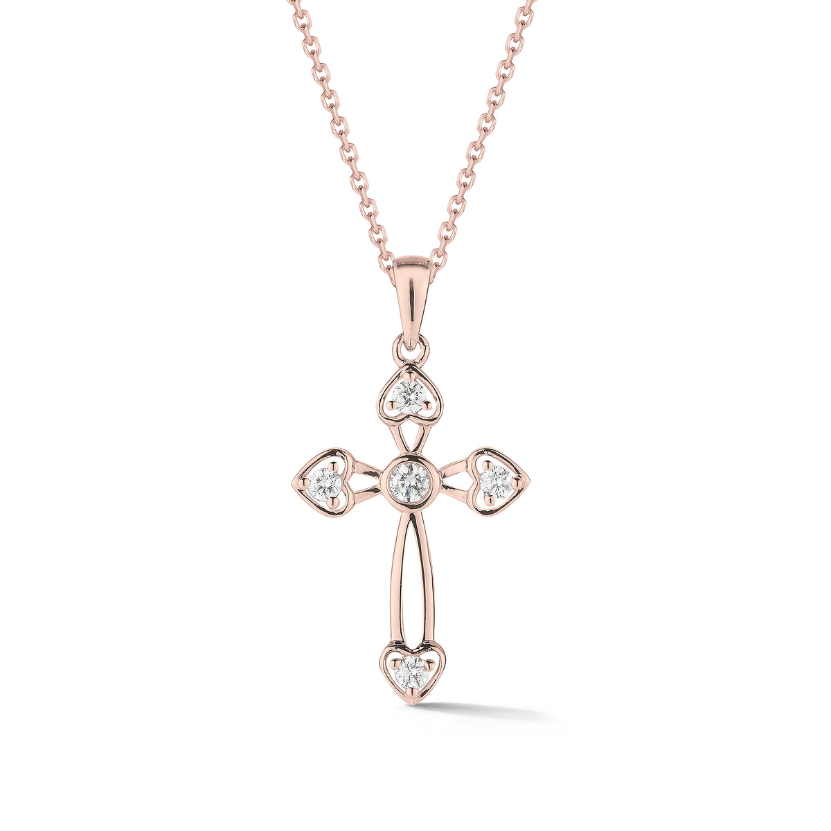 Diamond Cross Pendant with Heart-Shaped Corners  The perfect christening, communion, confirmation, birthday, or holiday gift.  -14K gold weighing 2.19 grams  -5 round prong-set brilliant diamonds totaling 0.15 carats