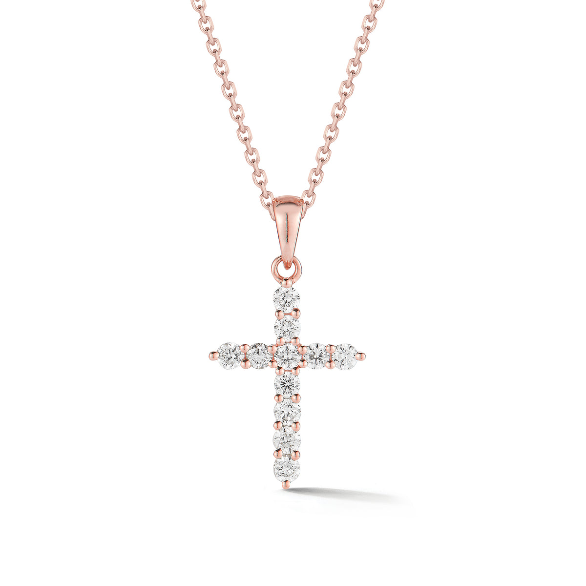 Diamond Slim Cross Pendant  -14K gold weighing 2.35 grams  -11 round shared prong-set brilliant diamonds totaling 0.33 carats.