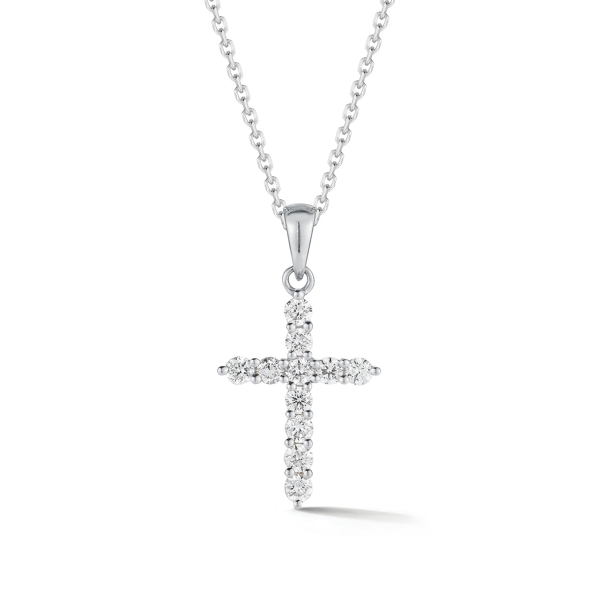 Diamond Slim Cross Pendant  -14K gold weighing 2.35 grams  -11 round shared prong-set brilliant diamonds totaling 0.33 carats.