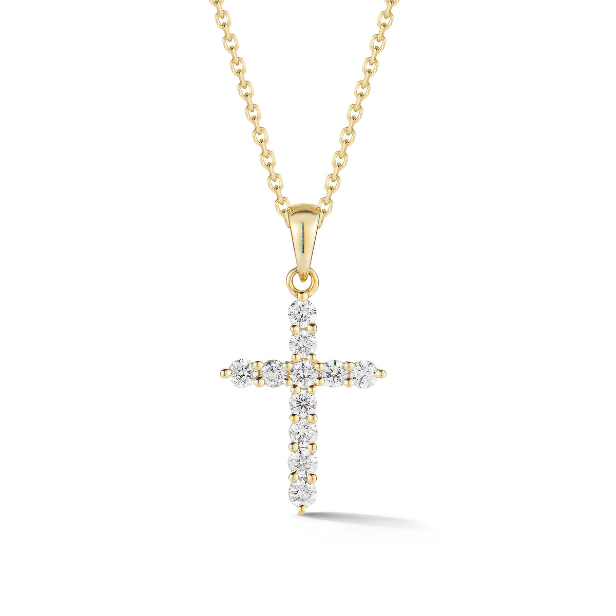 Diamond Slim Cross Pendant  -14K gold weighing 2.35 grams  -11 round shared prong-set brilliant diamonds totaling 0.33 carats.