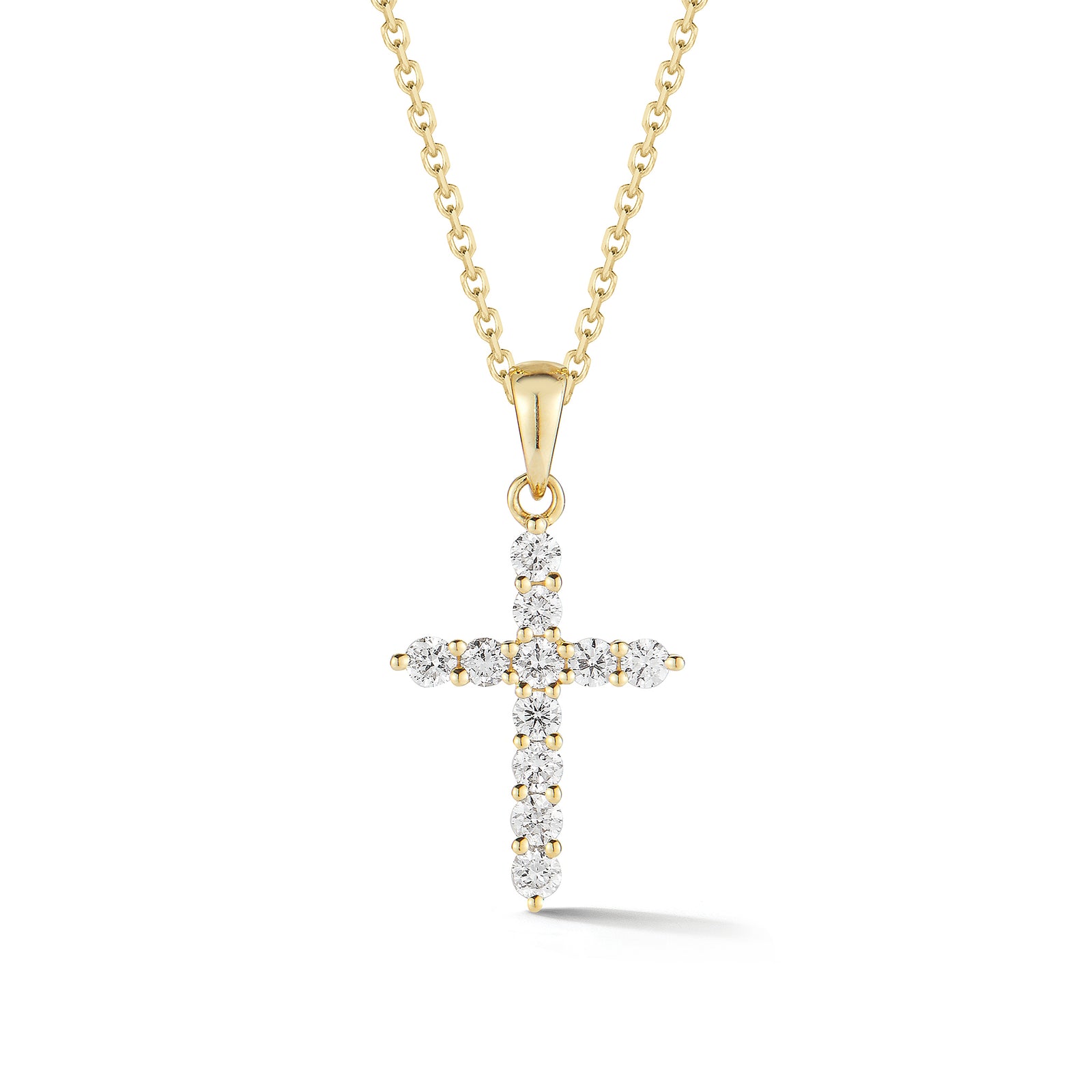Diamond Slim Cross Pendant  -14K gold weighing 2.35 grams  -11 round shared prong-set brilliant diamonds totaling 0.33 carats.