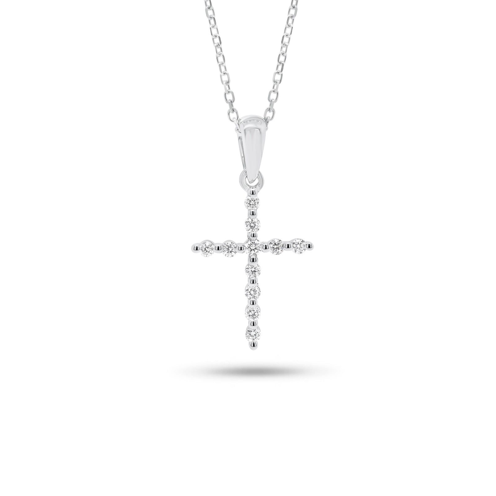 Diamond Skinny Cross Pendant - 18K gold weighing 0.64 grams  - 14K gold weighing 1.0 grams  - 11 round diamonds weighing 0.12 carats