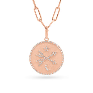 Diamond Crossed Arrows, Star & Moon Medallion Necklace  - 14K gold weighing 2.93 grams  - 109 round diamonds totaling 0.30 carats  Available in yellow, white, and rose gold.