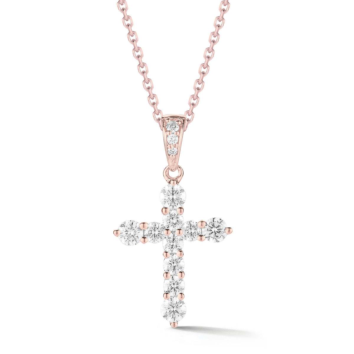 Graduated Diamond Cross Pendant  Makes for an ideal christening, communion, confirmation, birthday, or holiday gift!  -14K gold weighing 2.29 grams  -13 round shared prong-set brilliant-cut diamonds totaling 0.35 carats.
