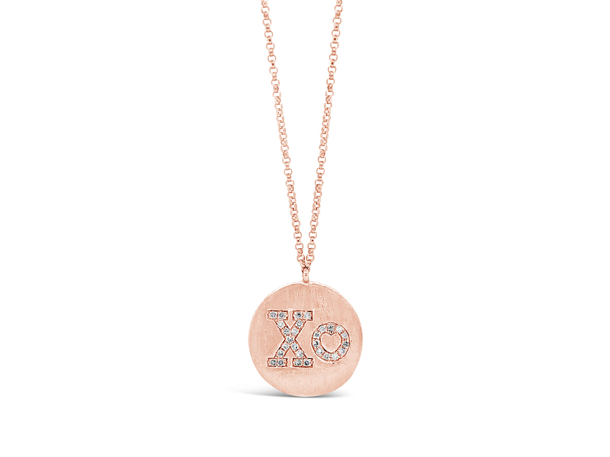 Diamond "XO" Disc Pendant Necklace -14K rose gold weighing 3.43 grams -28 round diamonds totaling .09 carats