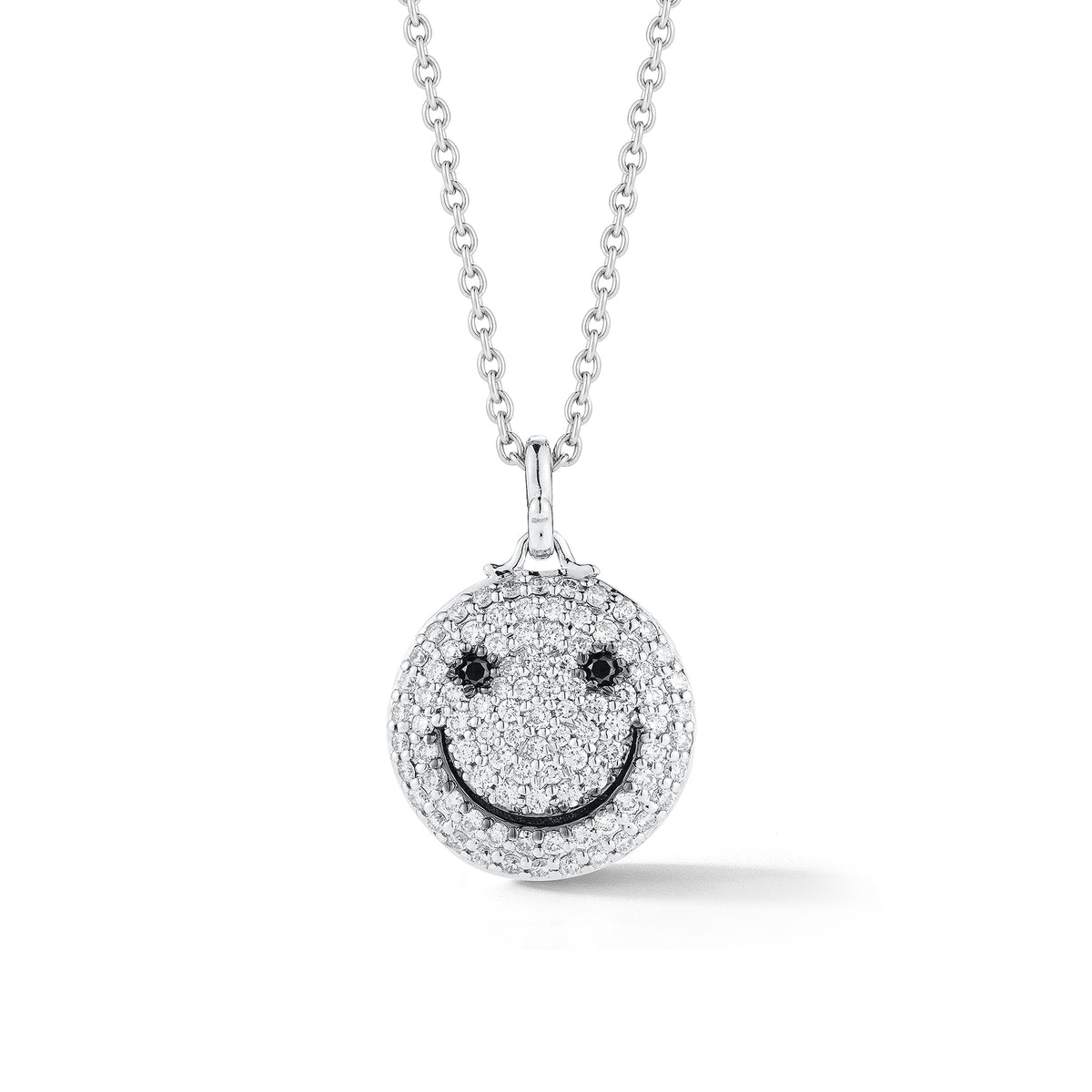 Diamond Smile Pendant     - 14k gold weighting 8.80 grams.  - 92 round prong-set diamonds .95 carats, 2 black round prong-set diamonds .06 carats.  Size 17 millimeters diameter.