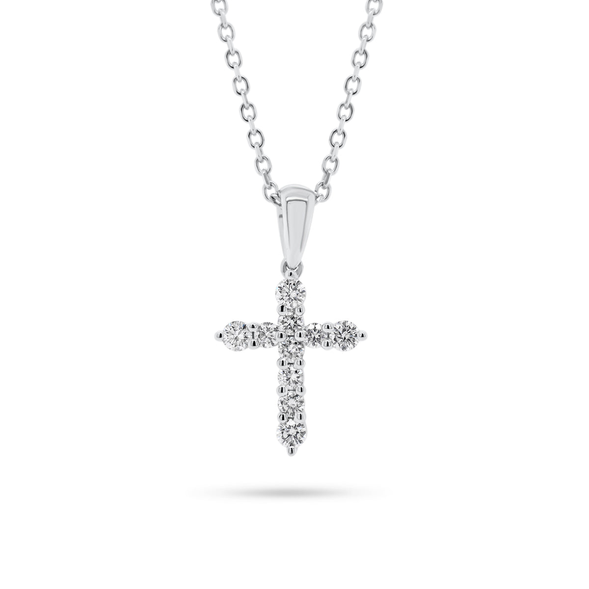 Diamond 10-Stone Small Cross Pendant  - 14K gold weighing 2.20 grams  - 10 round diamonds totaling 0.22 carats