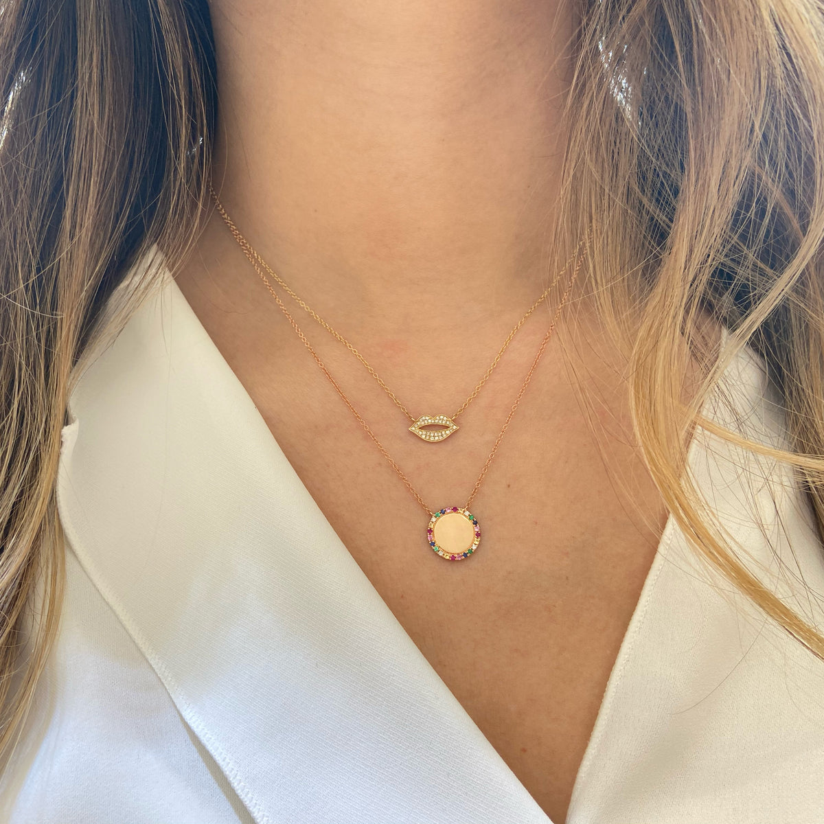 Female Model Wearing Diamond Lips Necklace  -14K yellow gold weighing 1.87 grams  -35 round pave set diamonds totaling .10 carats