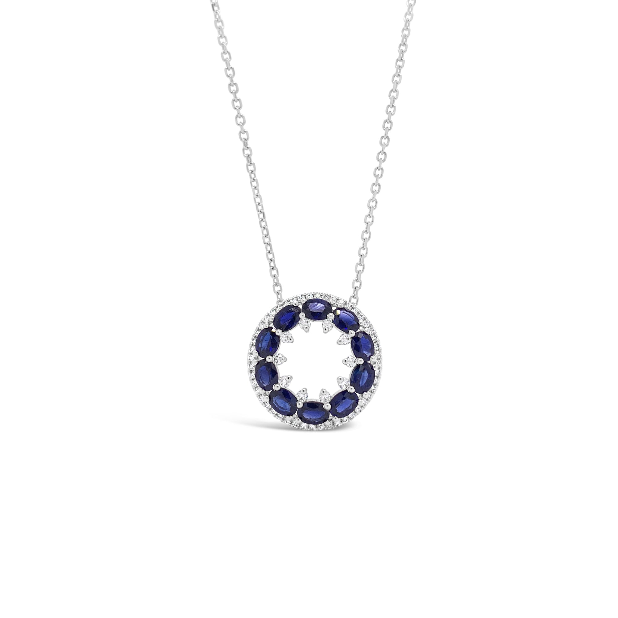 Sapphire & Diamond Circle Pendant Necklace -10 oval-shaped sapphires totaling 2.06 carats -58 round diamonds totaling 0.29 carats