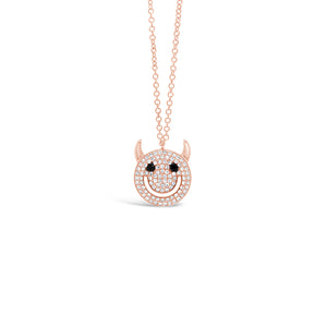 Solid 14k rose gold weighing 2.51 grams with 96 round diamonds weighing .21 carats and 2 black round diamonds weighing .03 carats Devil Smiley Face Pendant Necklace | Nuha Jewelers