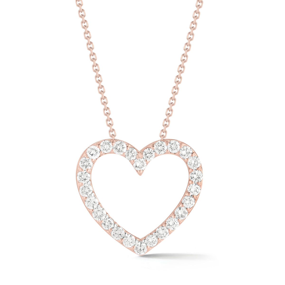 Diamond Heart Cutout Pendant Necklace  -14K gold weighing 3.3 grams  -26 round shared prong-set brilliant diamonds totaling 0.75 carats  -Chain measures 16 inches.