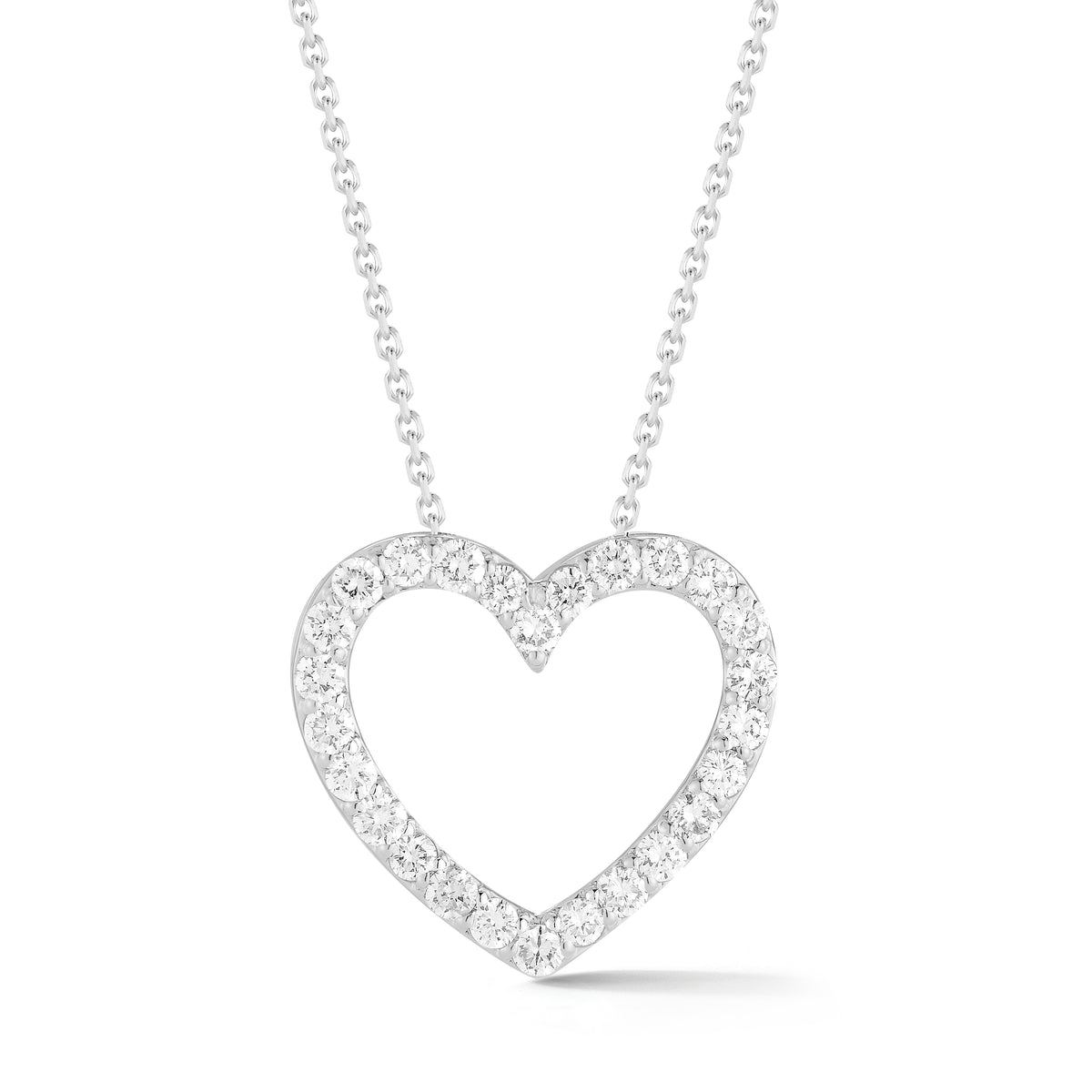 Diamond Heart Cutout Pendant Necklace  -14K gold weighing 3.3 grams  -26 round shared prong-set brilliant diamonds totaling 0.75 carats  -Chain measures 16 inches.