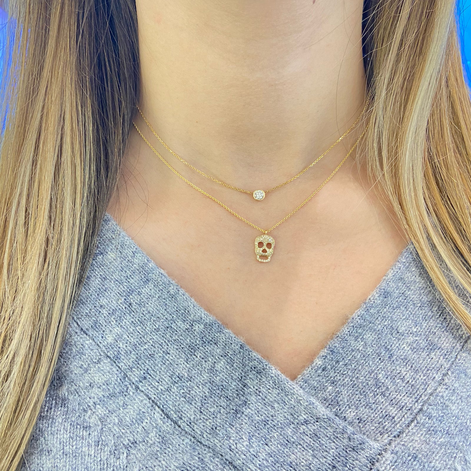 Diamond Skull Pendent  -14k gold weighing 2.23 grams  -92 round diamonds weighing .23 carats